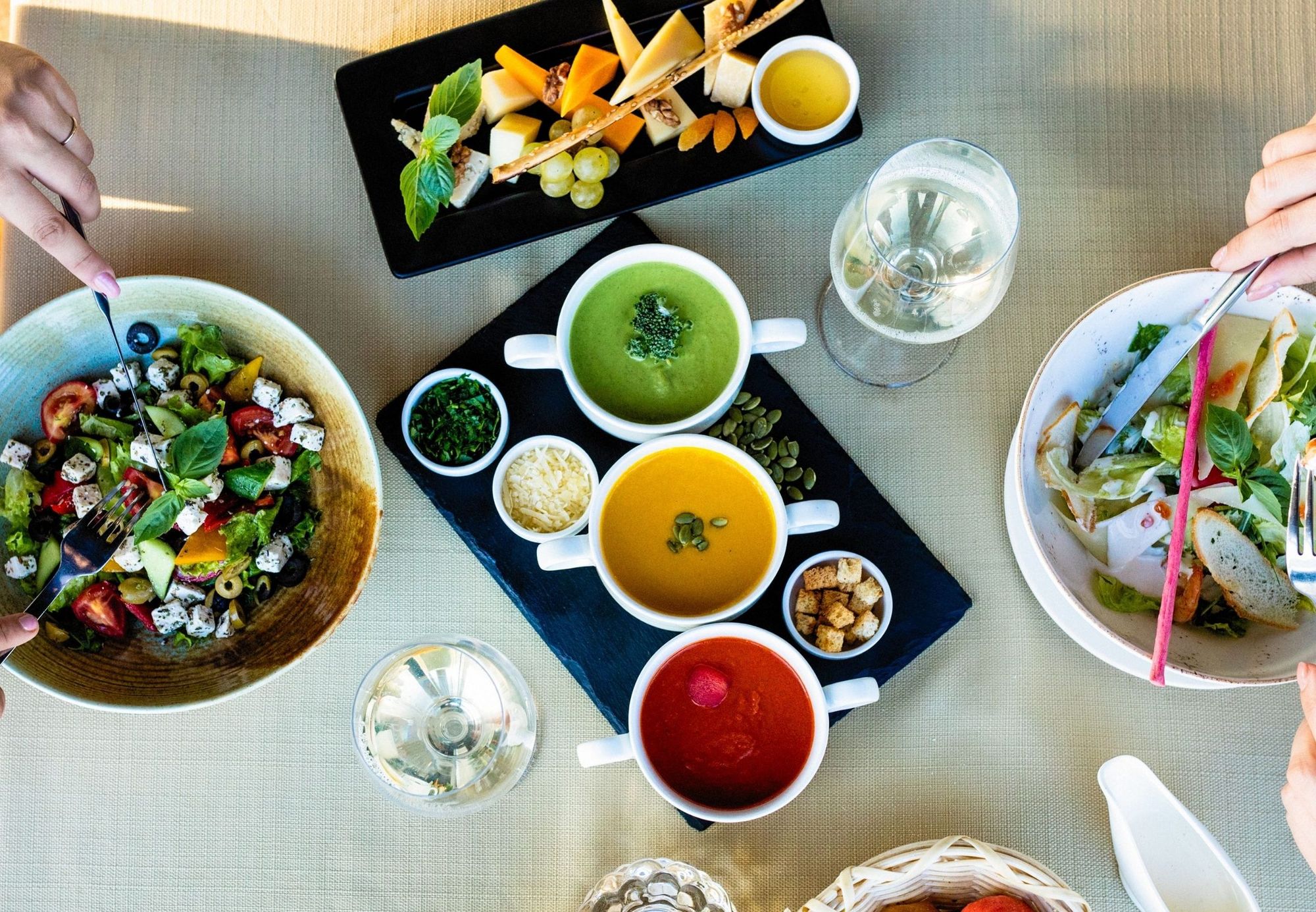 Bowls and plates shared across an outdoor table
