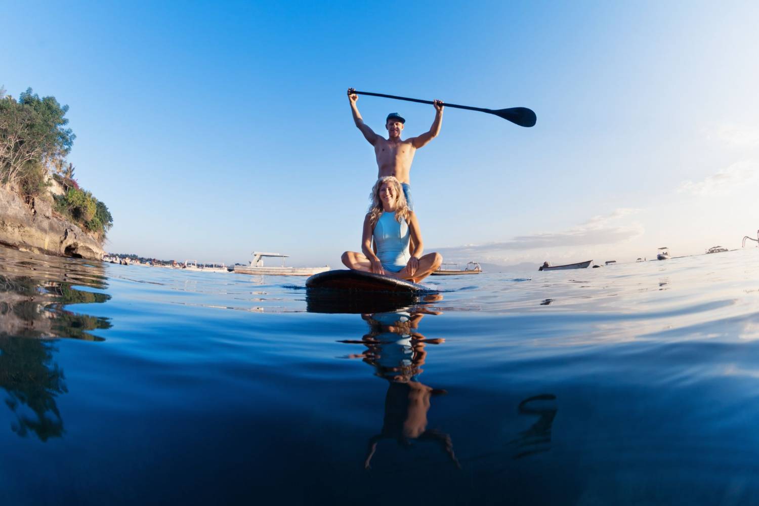 Paddleboarding on calm water on the Australian coast