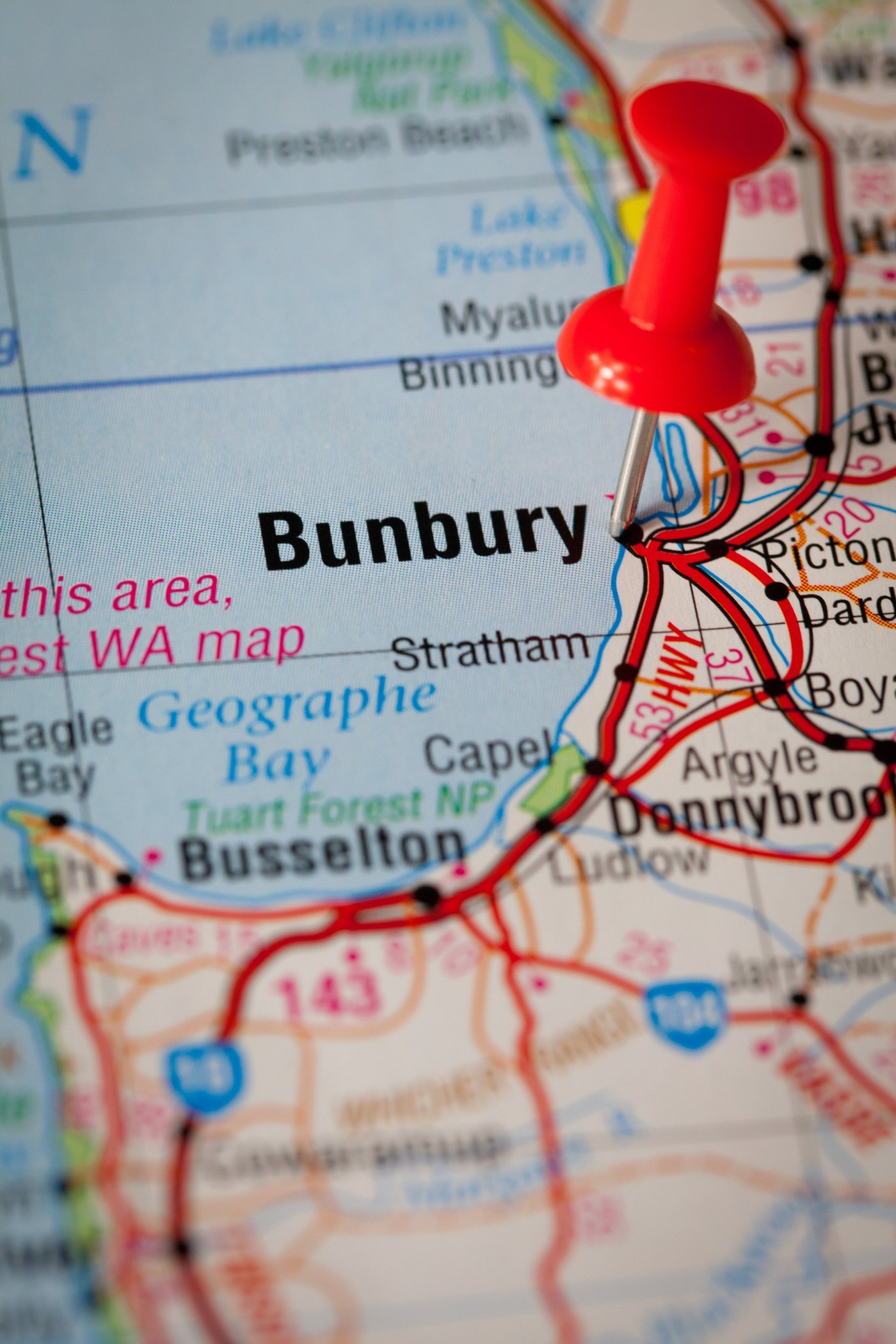 A pin in a road map of Western Australia, marking Bunbury south of Perth