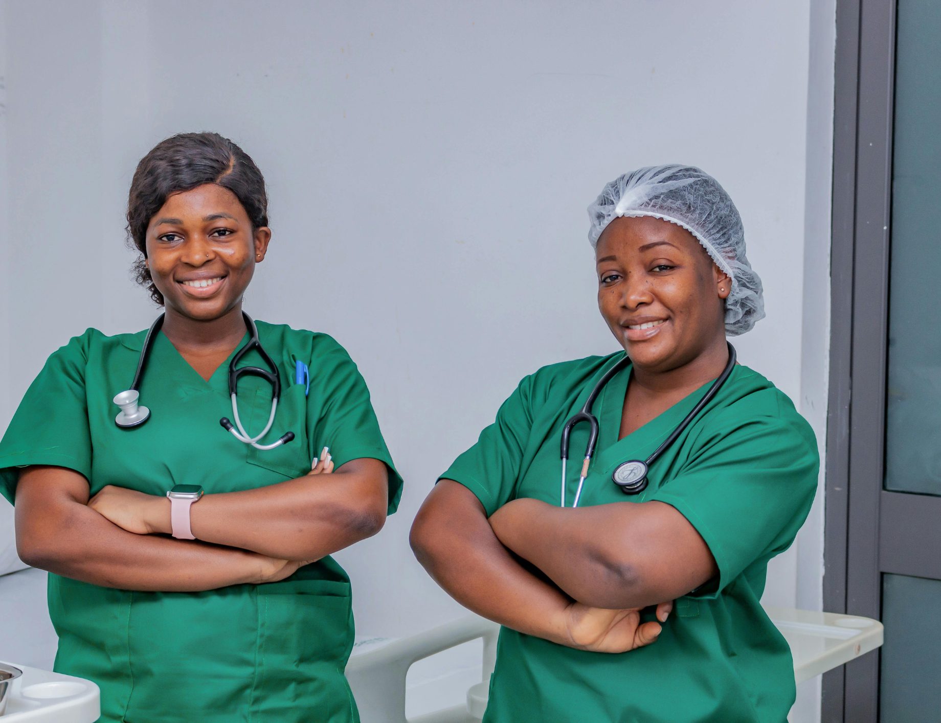 A group of hospital nurses standing together on a ward