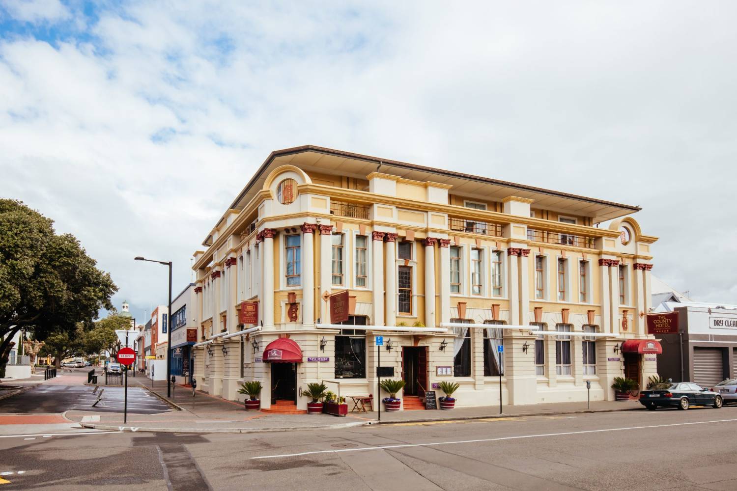Art Deco buildings along a sunlit Napier street