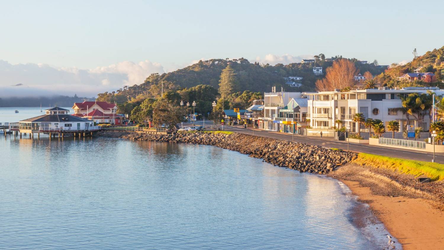 The Paihia waterfront in the Bay of Islands, boats moored in calm water