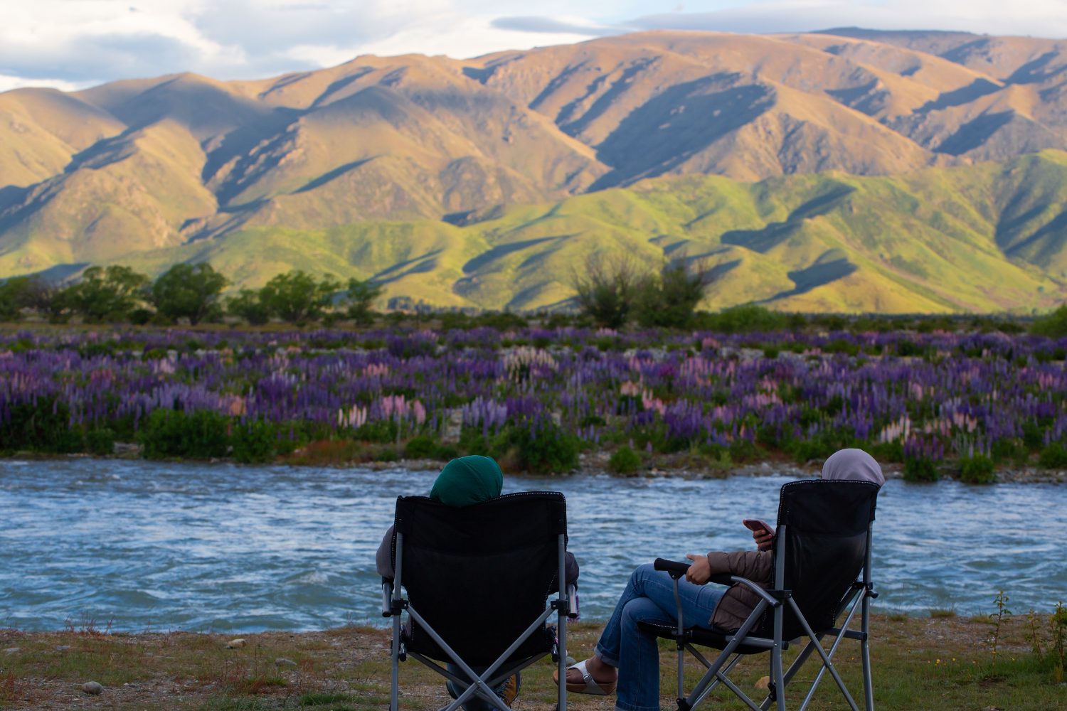 Lake Tekapo under snow-capped peaks