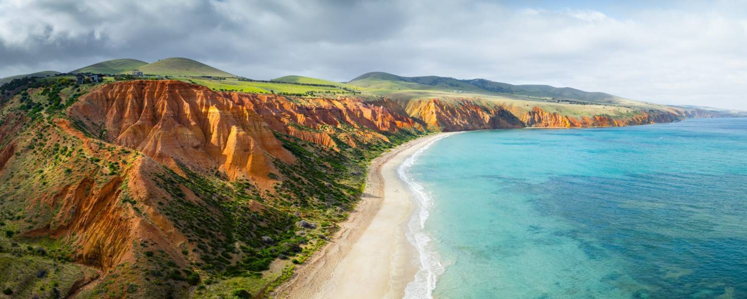 Red cliffs above a turquoise bay on the South Australian coast