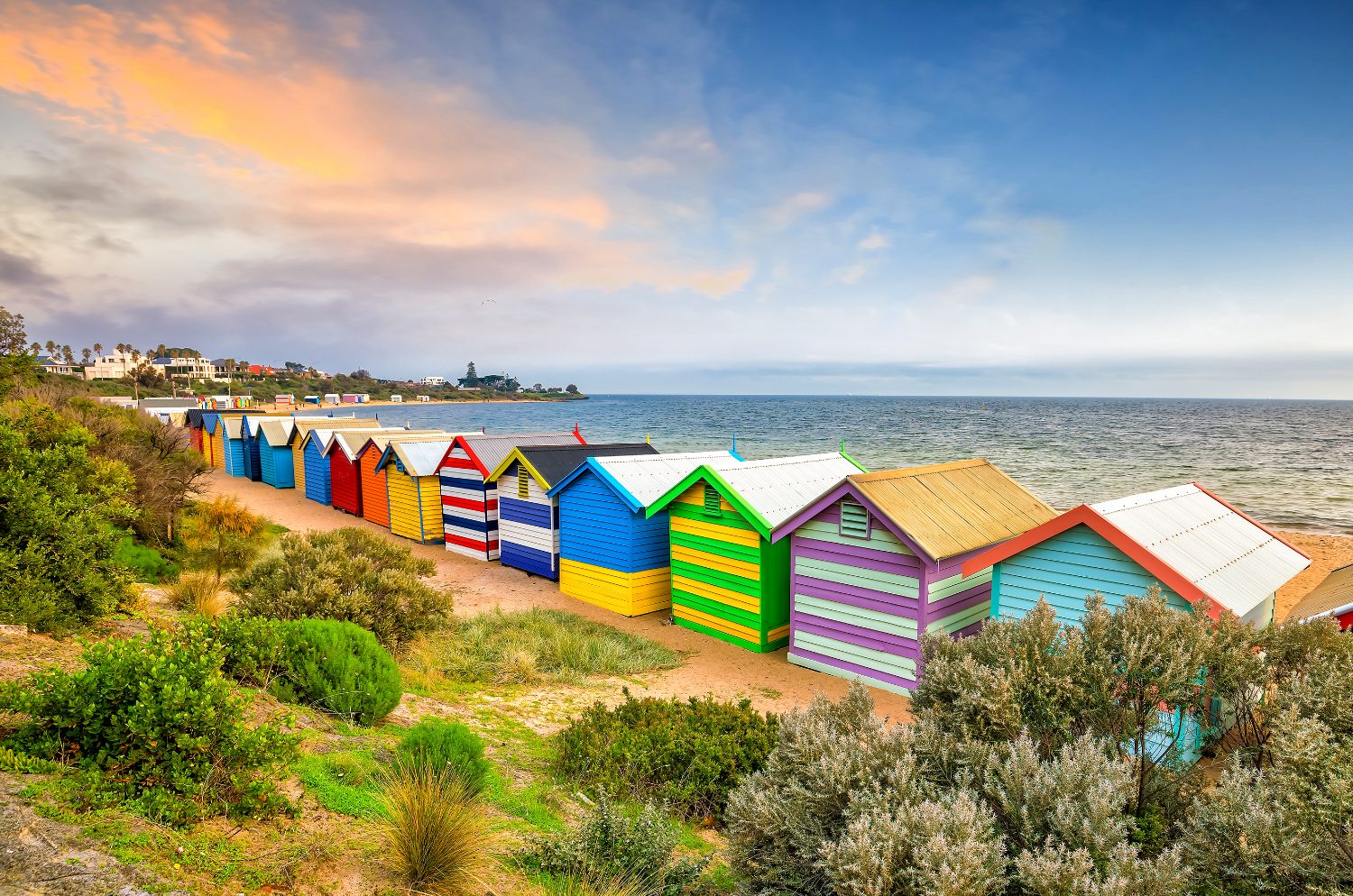 Painted bathing boxes on Brighton beach, Melbourne