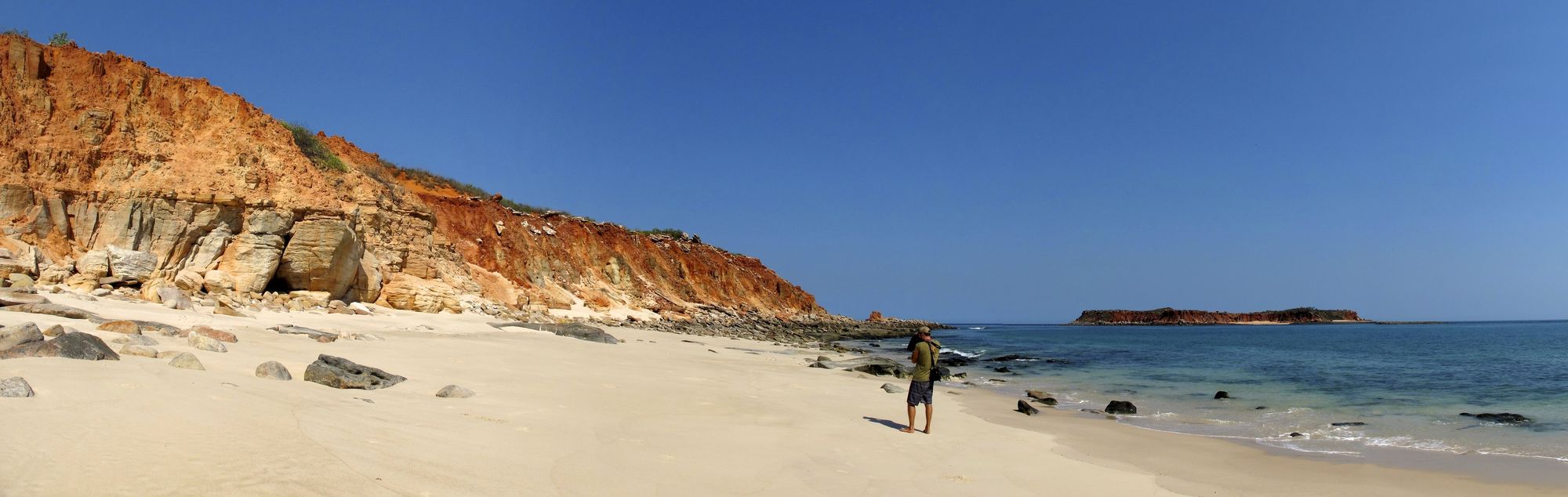 Red cliffs meeting white sand and blue water at Cape Leveque in the Kimberley