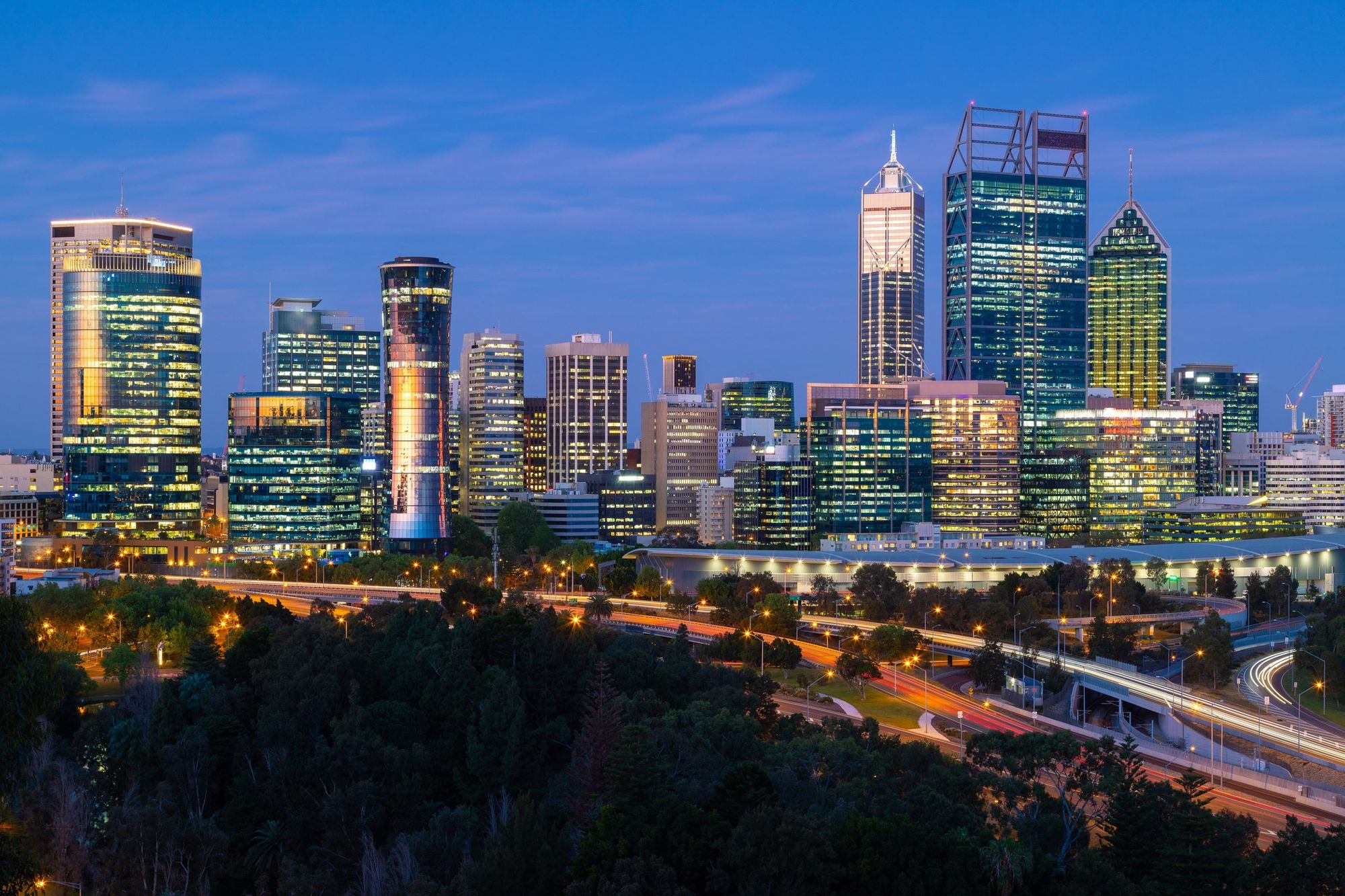 The Perth skyline at blue hour, reflected in the Swan River