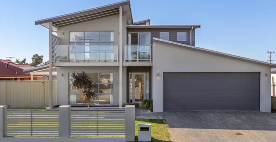 A modern two-storey house on a suburban street in Bunbury